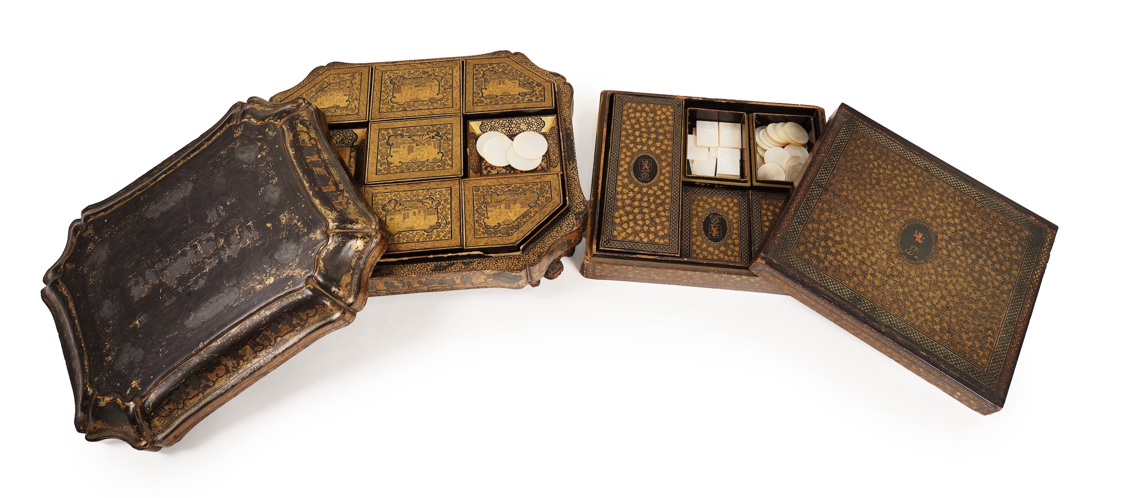 Two Chinese gilt decorated black lacquer games boxes, containing numerous mother-of-pearl counters, 19th century